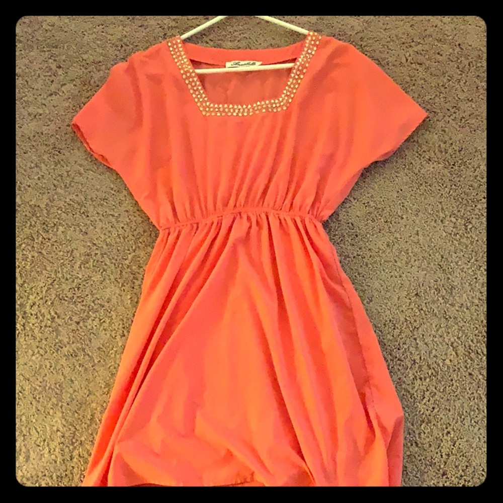 Coral Frances’s dress with embellished neckline